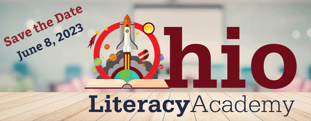 Blurred image of a classroom with the words Ohio Literacy Academy in the middle. 